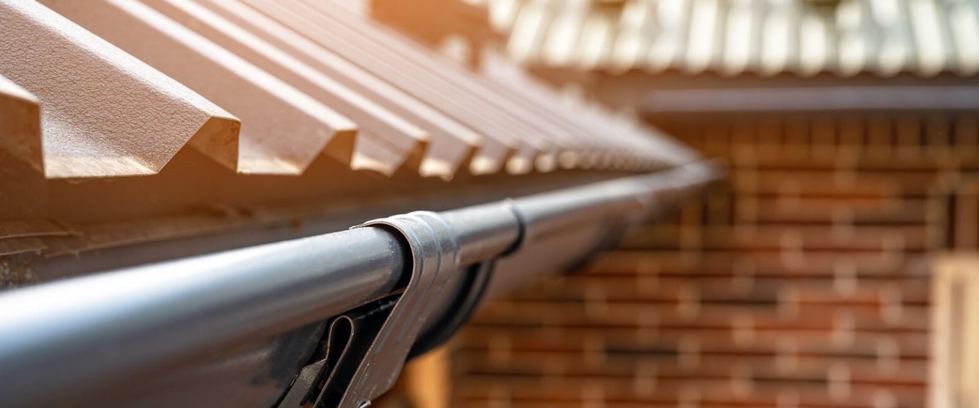 Why Metal Roofing In Malta, NY Needs Quality Gutter Services For Optimal Performance